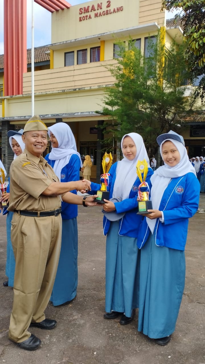 Nofitriandina Rahma Dewi dan Nofitriandini Rizma Dewi (XII F3.2) Juara 2 Tari dalam kejuaran FLS2N tingkat Kota Magelang tahun 2024.