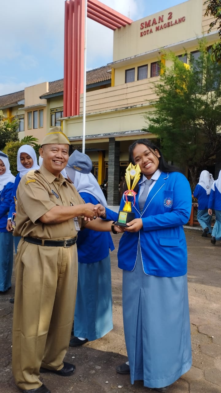 Felicita Rosalina Tiens Rahajaan (XII F3.2) Juara 2 Menyanyi Solo Putri dalam kejuaran FLS2N tingkat Kota Magelang tahun 2024.